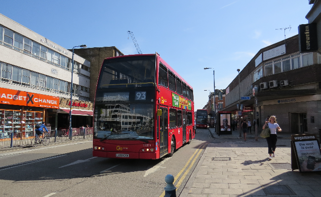 Red london bus on the streets of Putney